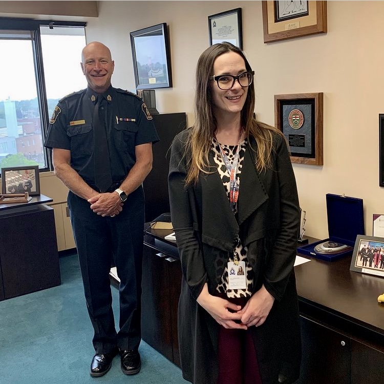 Chief Pedersen and Cassandra man and woman standing and smiling