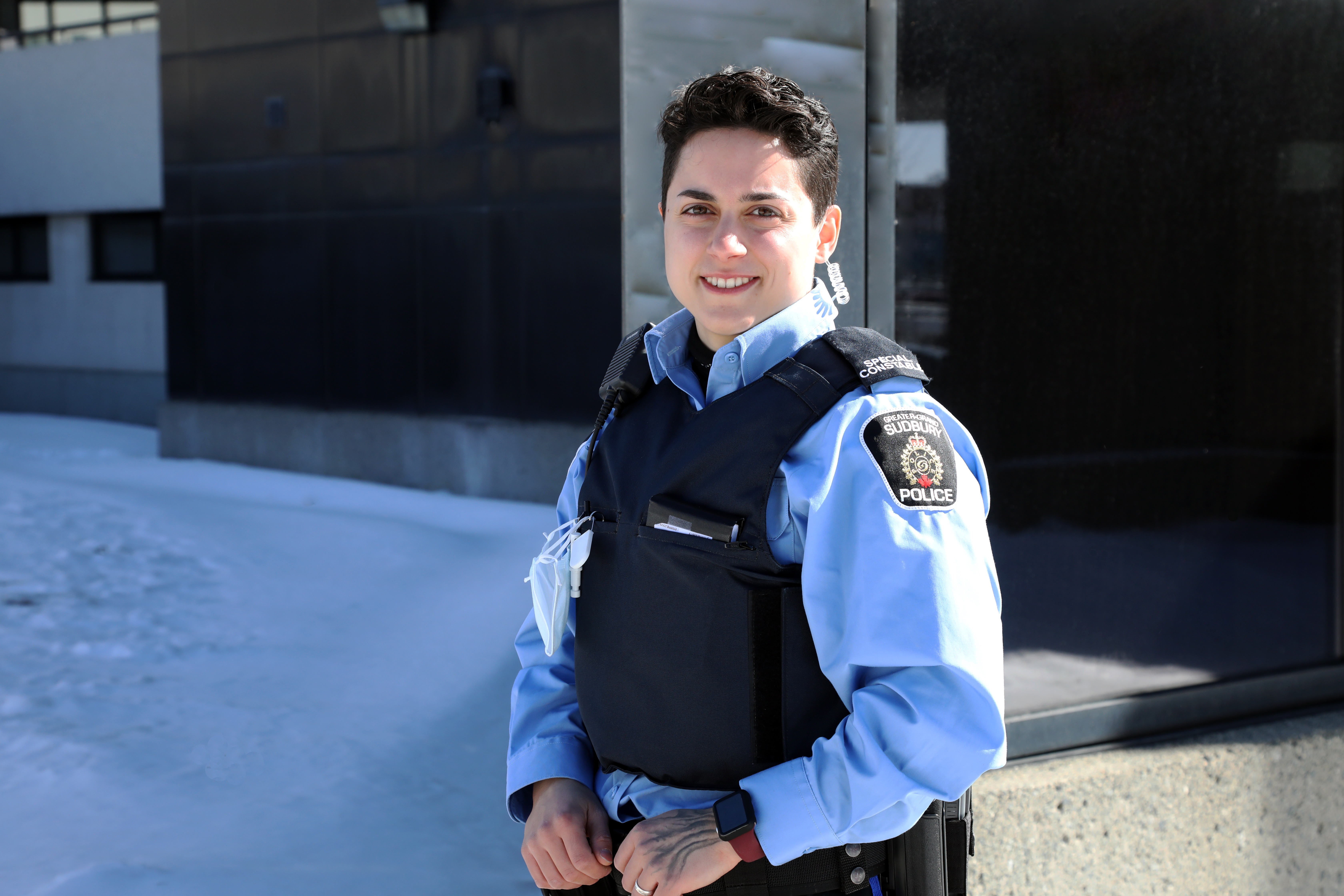 Sabrina Stalteri woman in uniform standing outside smiling