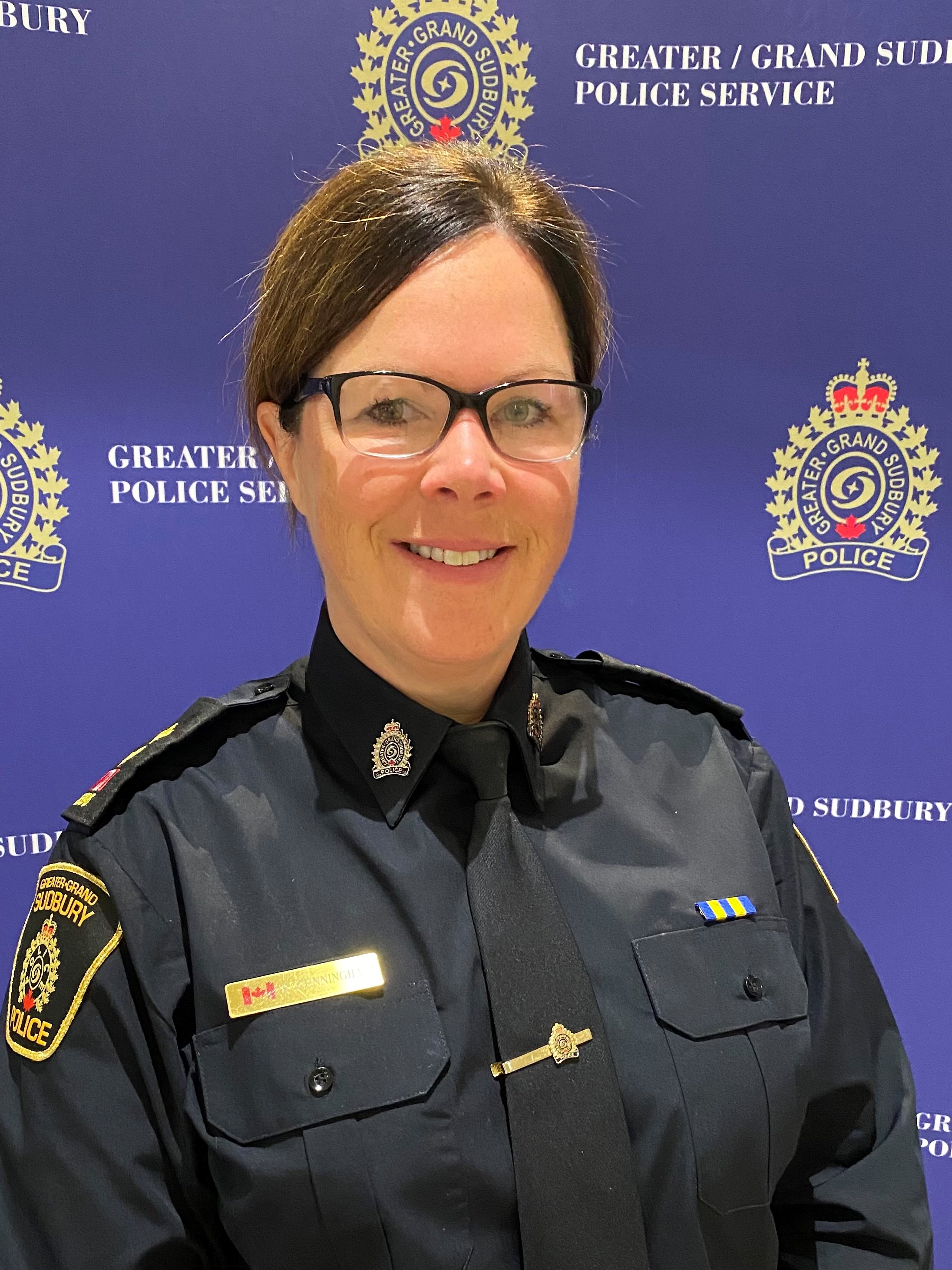 Deputy Chief Sara Cunningham police officer smiling