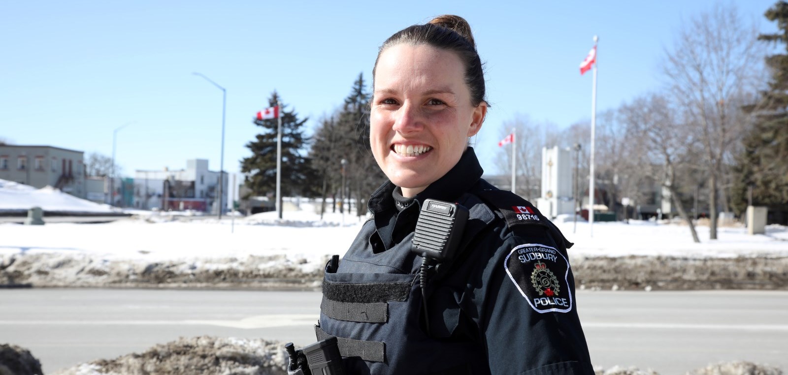 Constable Julie Blais female Officer standing outside smiling